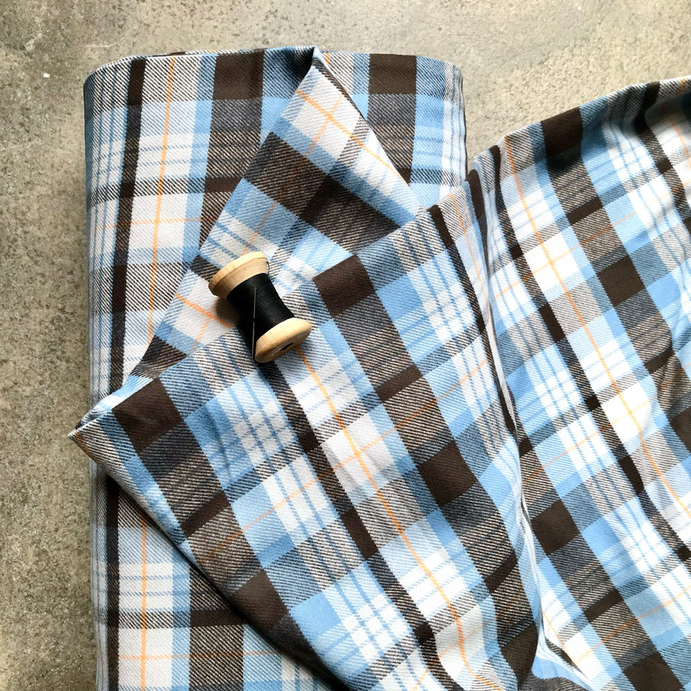 Plaid fabric with blue and brown colors
