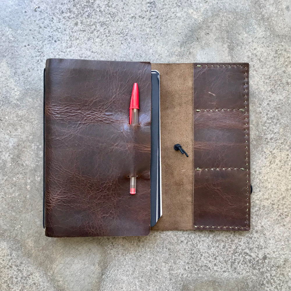 Leather notebook cover with Rui Daniel