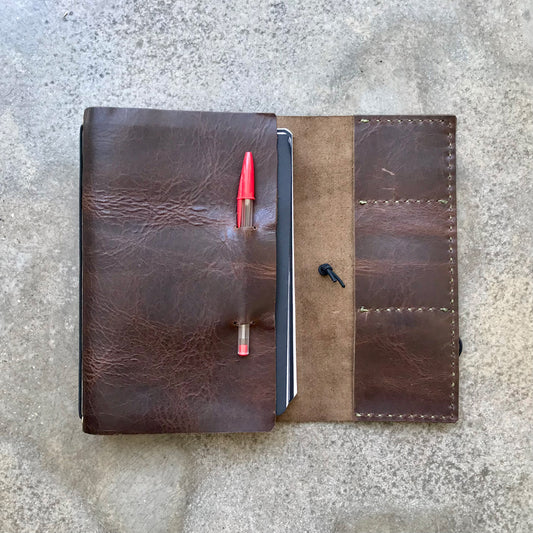 Leather notebook cover with Rui Daniel