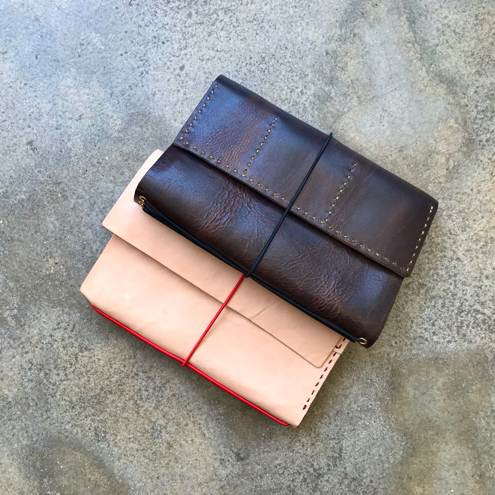 Leather notebook cover with Rui Daniel