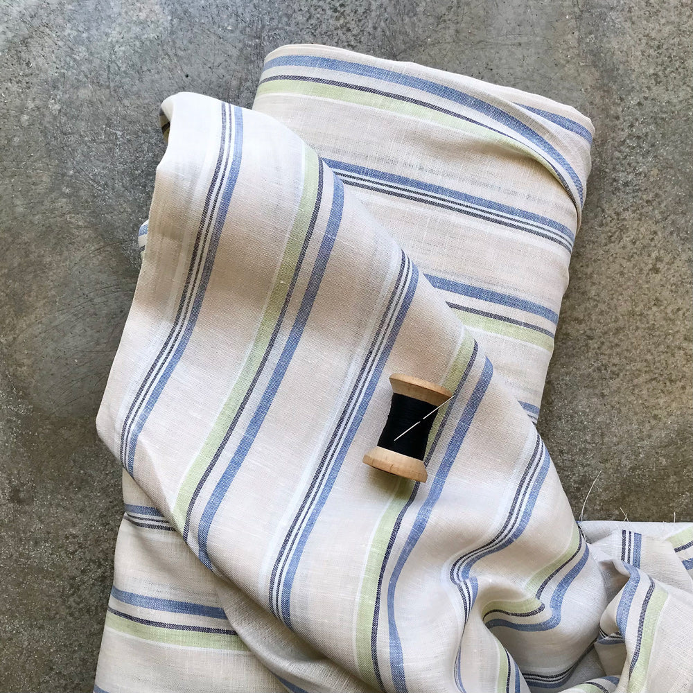 Samica B: natural linen fabric with vertical stripes in blue, green, and black