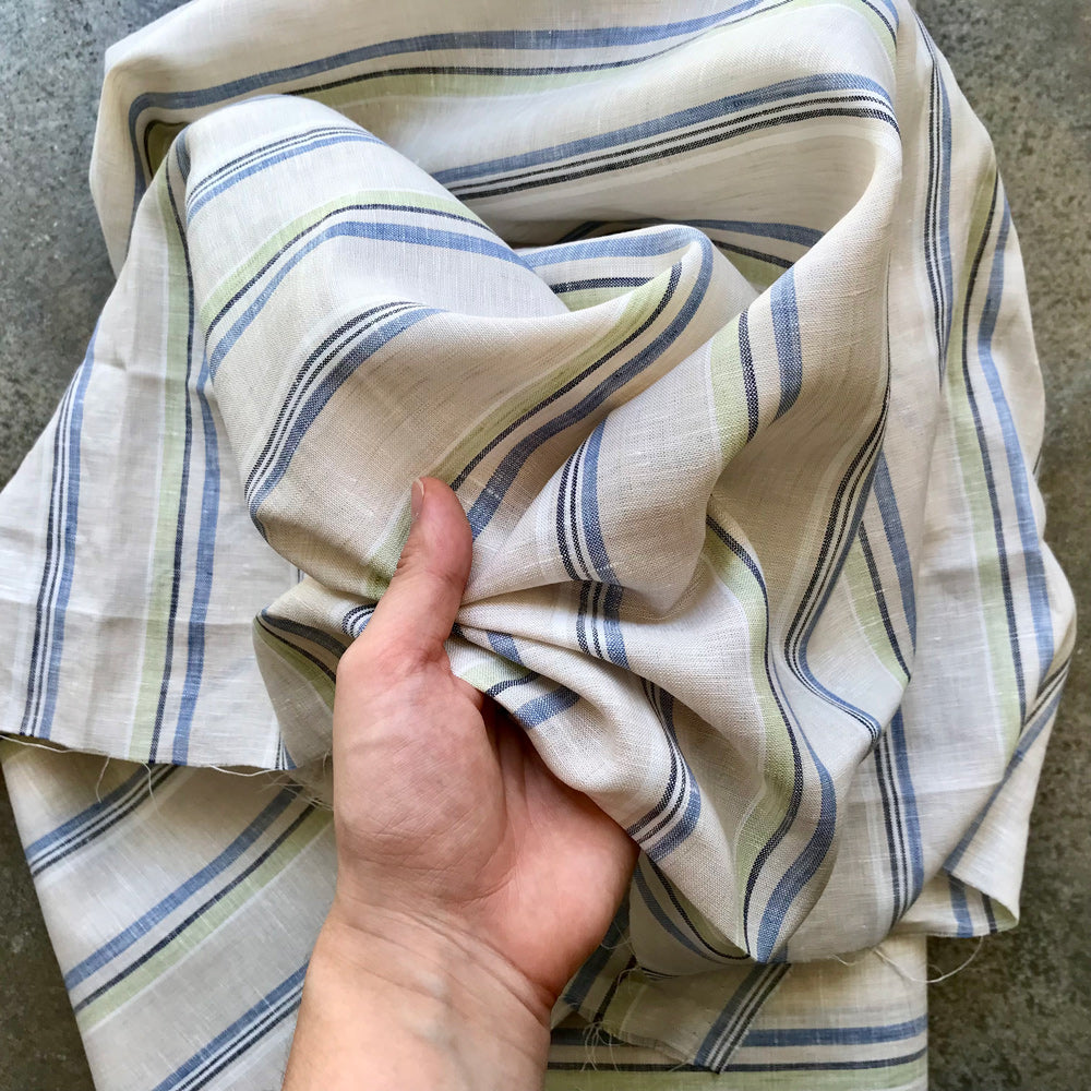 Samica B: natural linen fabric with vertical stripes in blue, green, and black