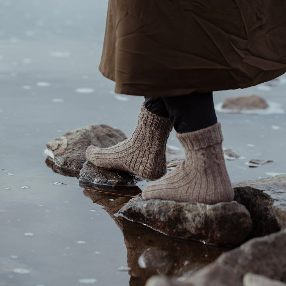  The Island and the Forest: A Knitted Correspondence