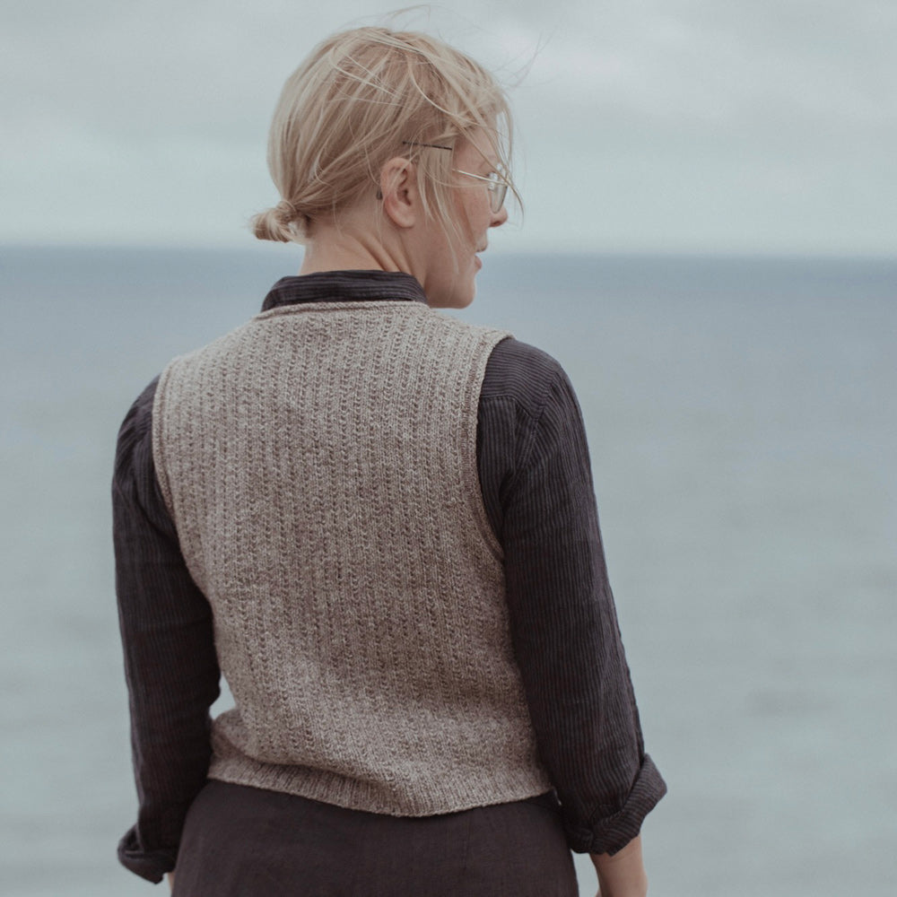 The Island and the Forest: A Knitted Correspondence